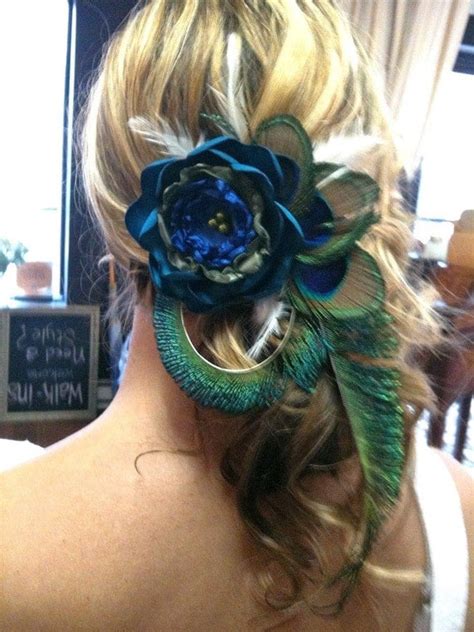 A Beautiful Peacock hair clip with large flower 6 weeks