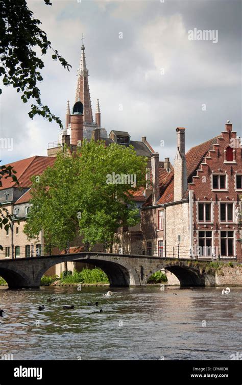 Canal and bridge in Bruges, Belgium Stock Photo - Alamy