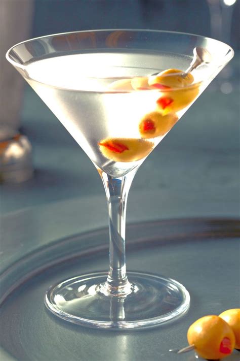 The classic dry Gin Martini contains just three simple ingredients - gin, vermouth, and either a ...