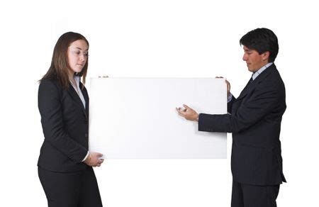 business partners holding a banner for you to write something on it | Freestock photos