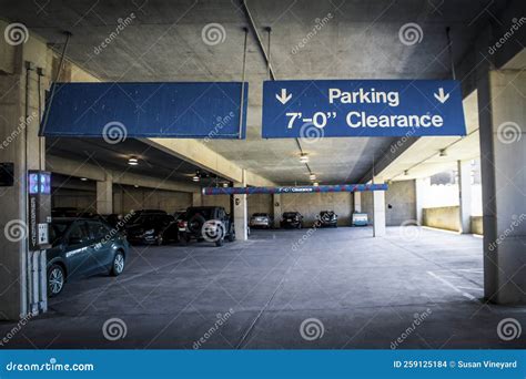 Concrete Parking Garage with Signs Saying Seven Foot Clearance with ...