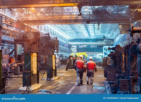 Workers in the Steel Mill. Factory Worker Takes a Sample for Metal ...