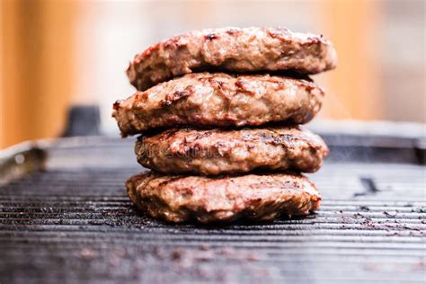 Pile of Grilled Ground Beef Patties on BBQ Stock Image - Image of ...