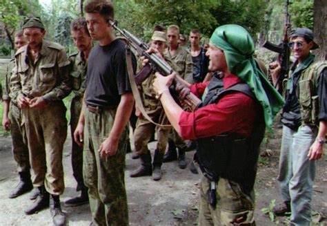 Chechen rebels with some very unlucky Russian POW's during the first ...