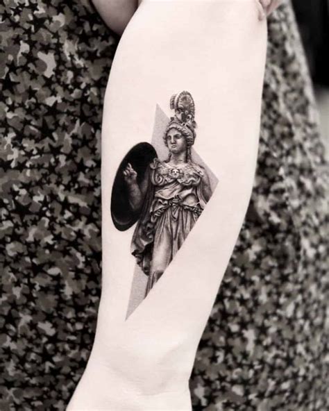 Athena Tattoos Explained: Origins, Meanings & Tattoo Ideas