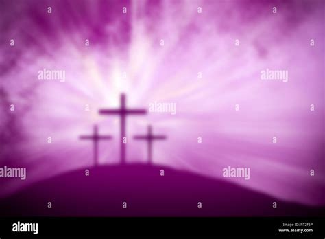 religious easter purple lent background with magical blurred crosses on ...