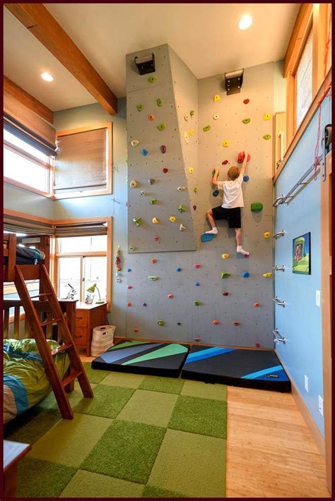 10 Modern Houses With Rock Climbing Walls This rock climbing wall in a kids bedroom has a couple ...