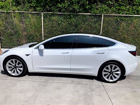 White Tesla Model 3 with 30% tinted side windows – Tesla Model 3 Wiki