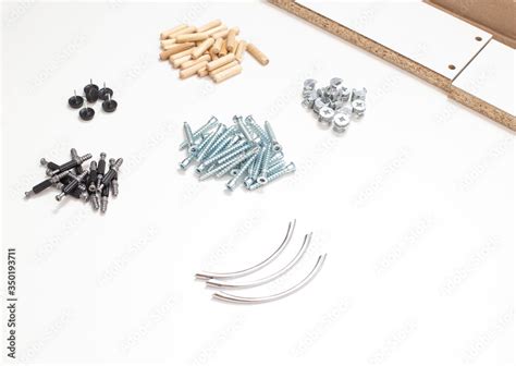 spare parts for furniture assembly on a white background Stock Photo ...