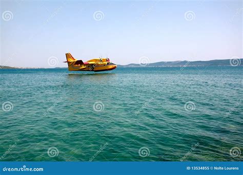 Plane landing on water stock image. Image of help, sunny - 13534855