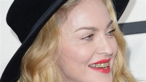 Madonna grilled on her odd teeth accessory