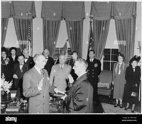 Photograph of Dean Acheson being sworn in as Secretary of State by Chief Justice Fred Vinson, as ...