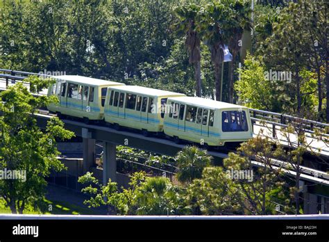 Airport Shuttle train takes passengers to gate Stock Photo - Alamy