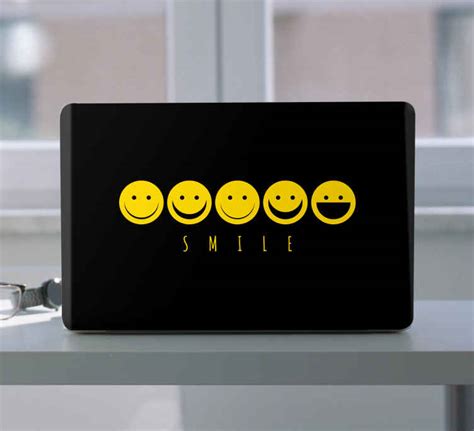 Yellow smile emoticon laptop sticker - TenStickers