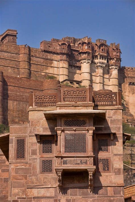 RAAS Jodhpur | The Haveli - Detail - Restored Jharokha against the backdrop of the Fort with ...