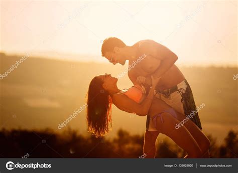 Couple dancing during sunset — Stock Photo © nd3000 #138028820