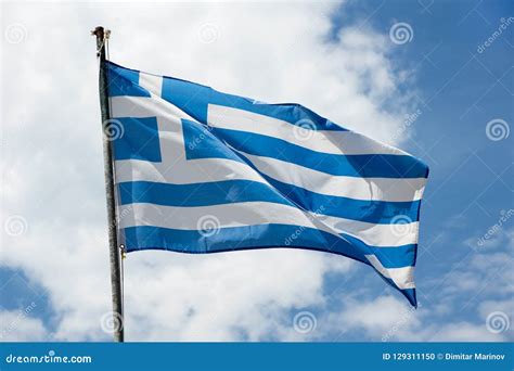 Waving Greece flag stock photo. Image of clouds, flutter - 129311150