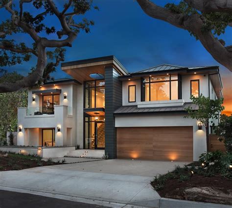 With a floor-to-ceiling glass wine cellar, backyard jacuzzi and this kind of curb appeal...who ...