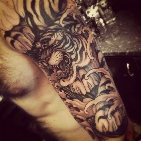 Tiger sleeve tattoo | Great tattoos, Tattoos, Animal tattoo