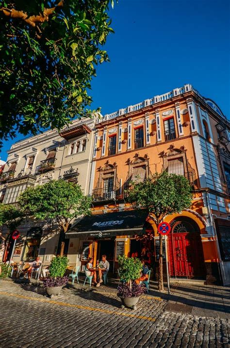 Cobblestone Street with Restaurant Terraces in the Historic Centre of Seville Editorial Image ...