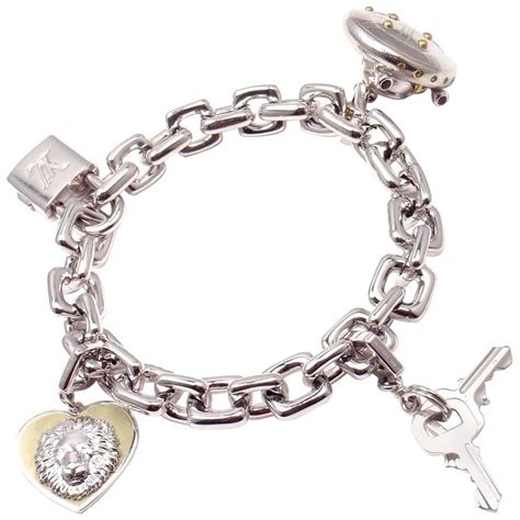 Louis Vuitton Charm Link White Gold Bracelet With Charms at 1stDibs | white gold charm bracelets ...