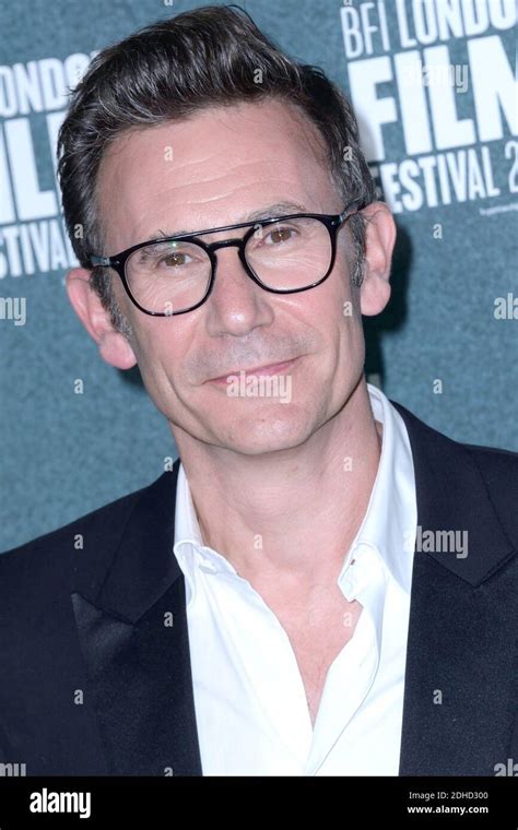 Michel Hazanavicius leaving the Redoutable Premiere during the BFI London International Film ...