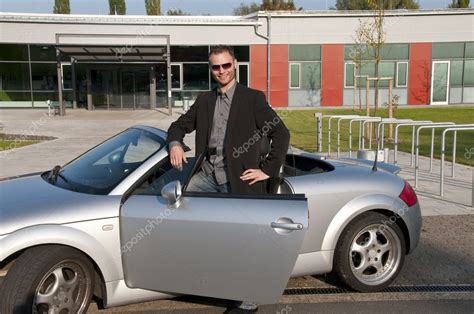 Man and his sports car — Stock Photo © runzelkorn #4469165