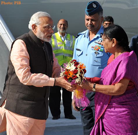 PM Modi being received by the Chief Minister of Gujarat