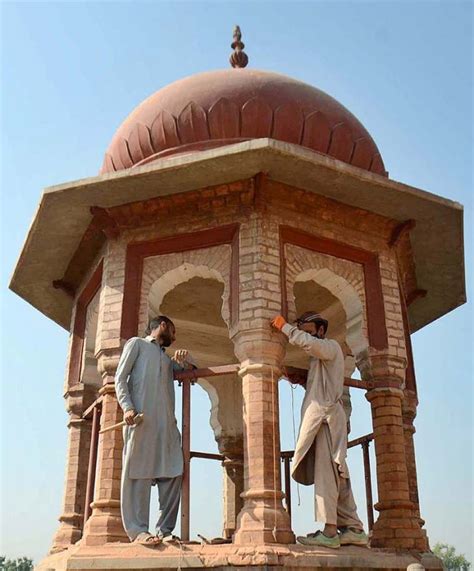 PESHAWAR: November 03 Labourers busy in renovation work of Peshawar Museum. APP Photo by ...