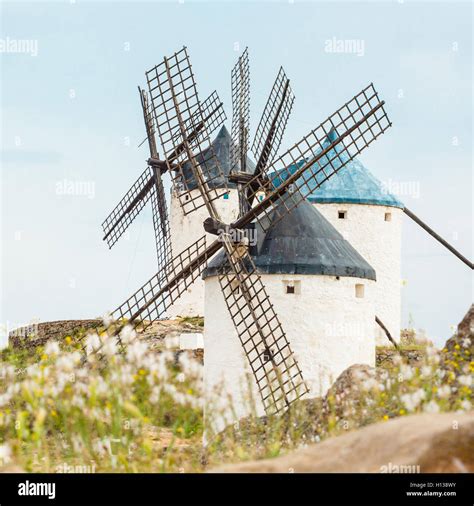 Vintage windmills in La Mancha Stock Photo - Alamy