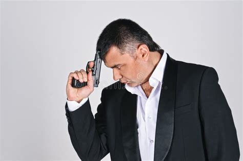 Man and pistol stock photo. Image of secret, macho, killer - 25757734