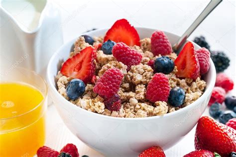 Healthy cereal breakfast with red fruits. — Stock Photo © karelnoppe #74715947