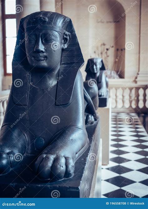 Vertical Shot of a Black Sphinx Sculpture in the Louvre Museum ...