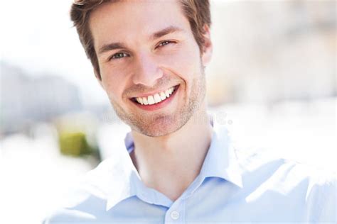 Young man smiling stock image. Image of smiling, outdoors - 32211701