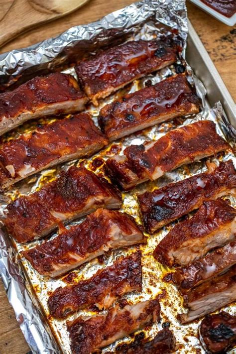 Tender Oven Baked BBQ Ribs That Fall Off the Bone | Recipe | Oven pork ribs, Pork rib recipes ...