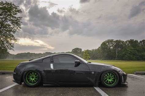 Peculiar Black Nissan 350Z Rocking Green Avant Garde Wheels — CARiD.com Gallery