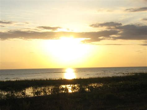 Sunset over Lake Okeechobee by packets4you on DeviantArt