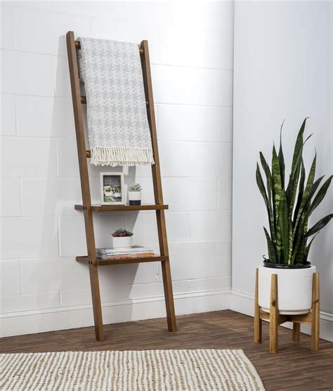 This leaning ladder rack shelving features three rods and two shelves. Find contemporary ...