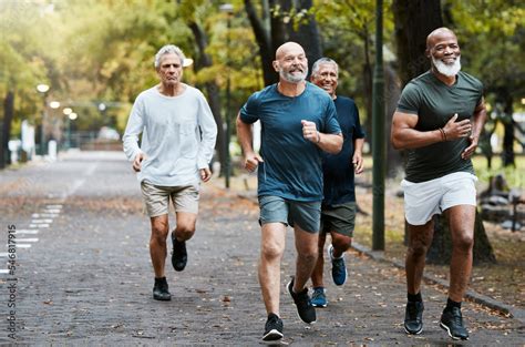 Senior, man group and running on street together for elderly fitness and urban wellness with ...