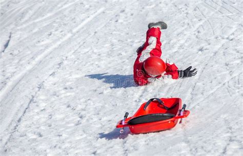 Kids Lying on Snow after Slide Accident Editorial Photo - Image of ...