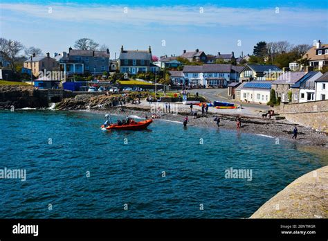 Moelfre beach on Anglesey in North Wales during Summer Stock Photo - Alamy