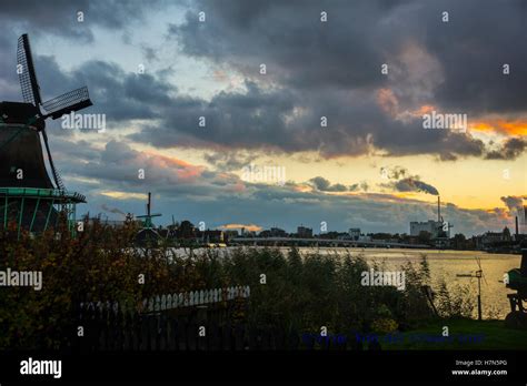 Windmills on water at Zaandam Stock Photo - Alamy