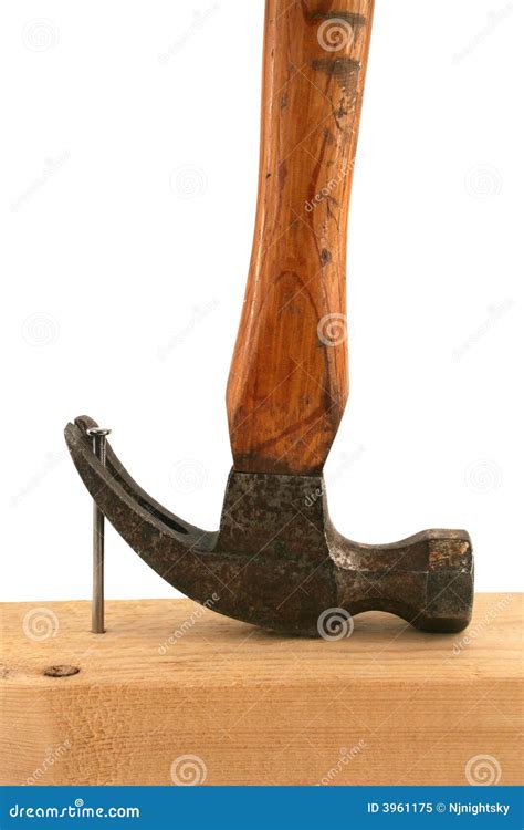 Hammer Pulling A Nail Out Of Wood Royalty-Free Stock Photo ...