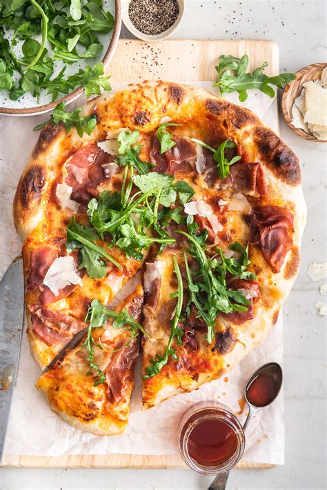 prosciutto pizza with arugula | With Spice