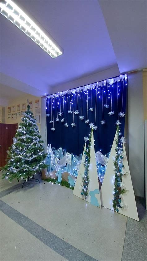 an office decorated with christmas trees and lights