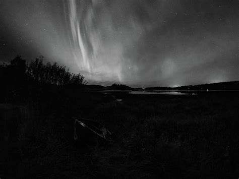 The boat under the sky. Aurora borealis September 2023 22 bw Photograph ...