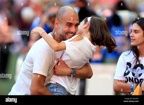 Manchester City manager Josep Guardiola celebrates with his daughter ...