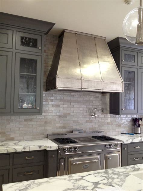 Kitchen backsplash with dark cabinets (38) | Kitchen | Kitchen vent ...