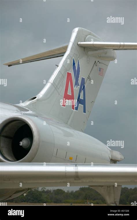 American Airline airplane tail and engine with logo Stock Photo - Alamy