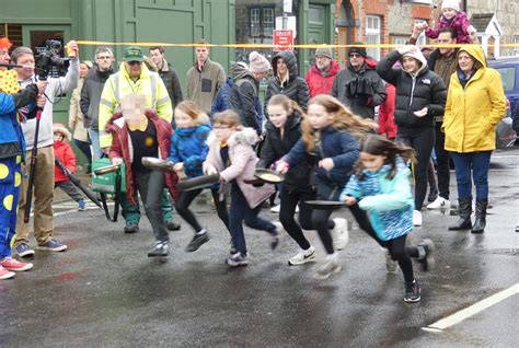 CHILDREN YOUNG AND OLD COMPETE IN YARMOUTH'S ANNUAL PANCAKE RACE ...